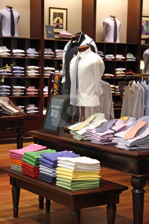 To use this stock image in your creative project, please select the size you need over to the right and click the "Add to Cart" button.
Your downloaded image will come with the Cutcaster watermark removed so don’t worry about the watermark you see on this page. Fashion retail stock photo, Fashion clothing retail display clothes for sale by Kheng Guan Toh