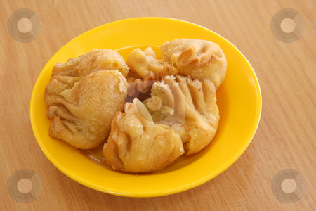 To use this stock image in your creative project, please select the size you need over to the right and click the "Add to Cart" button.
Your downloaded image will come with the Cutcaster watermark removed so don’t worry about the watermark you see on this page. Fried dimsum stock photo, Fried dimsum traditional chinese tidbits snack breakfast by Kheng Guan Toh