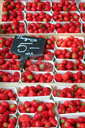 To use this stock image in your creative project, please select the size you need over to the right and click the "Add to Cart" button.
Your downloaded image will come with the Cutcaster watermark removed so don’t worry about the watermark you see on this page. Fresh strawberries stock photo, Fresh strawberries in baskets for sale in a market by Kheng Guan Toh