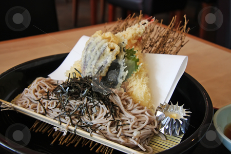 To use this stock image in your creative project, please select the size you need over to the right and click the "Add to Cart" button.
Your downloaded image will come with the Cutcaster watermark removed so don’t worry about the watermark you see on this page. Udon and tempura stock photo, Japanese cuisine udon and tempura fried prawns combo by Kheng Guan Toh