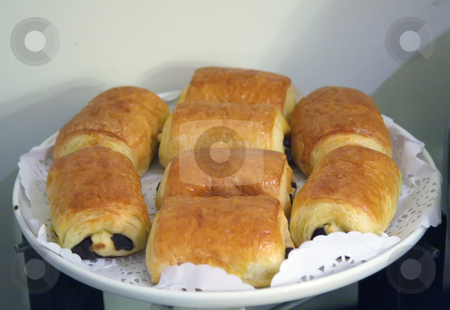 To use this stock image in your creative project, please select the size you need over to the right and click the "Add to Cart" button.
Your downloaded image will come with the Cutcaster watermark removed so don’t worry about the watermark you see on this page. Chocolate pastry stock photo, Plate of french pastry breads with chocolate by Kheng Guan Toh