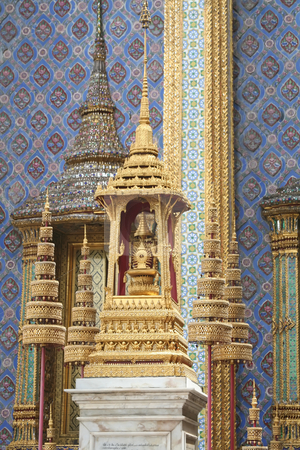 To use this stock image in your creative project, please select the size you need over to the right and click the "Add to Cart" button.
Your downloaded image will come with the Cutcaster watermark removed so don’t worry about the watermark you see on this page. Emerald Temple Buddha stock photo, Golden shrine detail in the Emerald Buddha Temple in Bangkok Thailand by Kheng Guan Toh