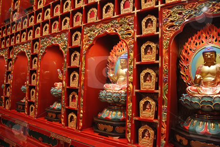 To use this stock image in your creative project, please select the size you need over to the right and click the "Add to Cart" button.
Your downloaded image will come with the Cutcaster watermark removed so don’t worry about the watermark you see on this page. Buddha statues stock photo, Golden buddha statue display in chinese temple by Kheng Guan Toh