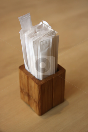 To use this stock image in your creative project, please select the size you need over to the right and click the "Add to Cart" button.
Your downloaded image will come with the Cutcaster watermark removed so don’t worry about the watermark you see on this page. Toothpicks stock photo, Individually wrapped toothpicks in wooden container Japanese restaurant by Kheng Guan Toh