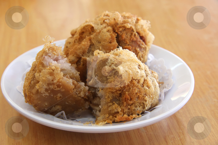 To use this stock image in your creative project, please select the size you need over to the right and click the "Add to Cart" button.
Your downloaded image will come with the Cutcaster watermark removed so don’t worry about the watermark you see on this page. Fried dimsum stock photo, Fried dimsum traditional chinese tidbits snack breakfast by Kheng Guan Toh