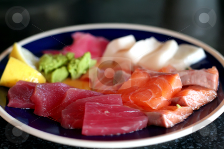 To use this stock image in your creative project, please select the size you need over to the right and click the "Add to Cart" button.
Your downloaded image will come with the Cutcaster watermark removed so don’t worry about the watermark you see on this page. Plate of sashimi stock photo, Arrangement of sashimi sliced raw japanese fish dish by Kheng Guan Toh
