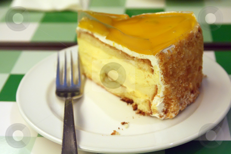 To use this stock image in your creative project, please select the size you need over to the right and click the "Add to Cart" button.
Your downloaded image will come with the Cutcaster watermark removed so don’t worry about the watermark you see on this page. Mango cream cake stock photo, Mango cream cake on white plate restaurant setting by Kheng Guan Toh