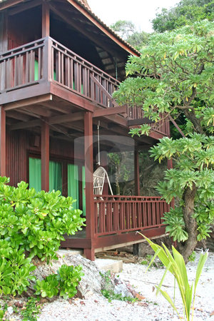 To use this stock image in your creative project, please select the size you need over to the right and click the "Add to Cart" button.
Your downloaded image will come with the Cutcaster watermark removed so don’t worry about the watermark you see on this page. Tropical beach house stock photo, Tropical balineses style resort beach house with balcony by Kheng Guan Toh