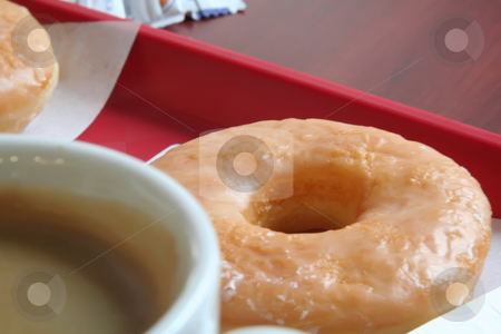 To use this stock image in your creative project, please select the size you need over to the right and click the "Add to Cart" button.
Your downloaded image will come with the Cutcaster watermark removed so don’t worry about the watermark you see on this page. Donut and coffee stock photo, Donut and coffee mug on a fast food tray by Kheng Guan Toh