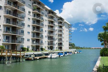 To use this stock image in your creative project, please select the size you need over to the right and click the "Add to Cart" button.
Your downloaded image will come with the Cutcaster watermark removed so don’t worry about the watermark you see on this page. Waterfront condo living stock photo, Florida style waterfront condo living by Lee Barnwell