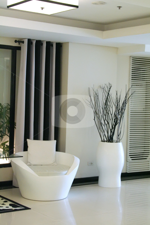 To use this stock image in your creative project, please select the size you need over to the right and click the "Add to Cart" button.
Your downloaded image will come with the Cutcaster watermark removed so don’t worry about the watermark you see on this page. Modern elegant room stock photo, Living room waiting room with elegant modern black and white design by Kheng Guan Toh