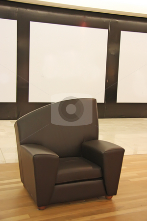 To use this stock image in your creative project, please select the size you need over to the right and click the "Add to Cart" button.
Your downloaded image will come with the Cutcaster watermark removed so don’t worry about the watermark you see on this page. Black leather sofa stock photo, Black leather sofa chair with wooden floor by Kheng Guan Toh
