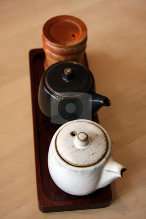 To use this stock image in your creative project, please select the size you need over to the right and click the "Add to Cart" button.
Your downloaded image will come with the Cutcaster watermark removed so don’t worry about the watermark you see on this page. Japanese condiment containers stock photo, Traditional japanese condiment containers painted ceramic pots by Kheng Guan Toh