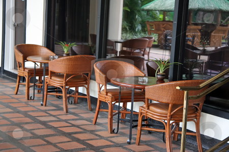 To use this stock image in your creative project, please select the size you need over to the right and click the "Add to Cart" button.
Your downloaded image will come with the Cutcaster watermark removed so don’t worry about the watermark you see on this page. Tropical cafe stock photo, Open air poolside tropical casual restaurant cafe furniture by Kheng Guan Toh