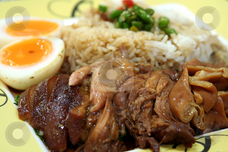 To use this stock image in your creative project, please select the size you need over to the right and click the "Add to Cart" button.
Your downloaded image will come with the Cutcaster watermark removed so don’t worry about the watermark you see on this page. Stewed pork chinese stock photo, Stewed pork with soya sauce on rice traditional chinese dish by Kheng Guan Toh