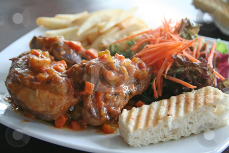 To use this stock image in your creative project, please select the size you need over to the right and click the "Add to Cart" button.
Your downloaded image will come with the Cutcaster watermark removed so don’t worry about the watermark you see on this page. Ossobuco roast lamb stock photo, Ossobuco roast lamb with frenchfries and vegetables by Kheng Guan Toh