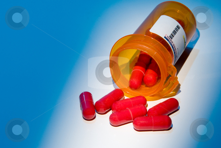 To use this stock image in your creative project, please select the size you need over to the right and click the "Add to Cart" button.
Your downloaded image will come with the Cutcaster watermark removed so don’t worry about the watermark you see on this page. Prescription Medication stock photo, Prescription pills in a plastic medicine bottle. by Robert Byron