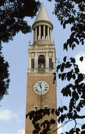To use this stock image in your creative project, please select the size you need over to the right and click the "Add to Cart" button.
Your downloaded image will come with the Cutcaster watermark removed so don’t worry about the watermark you see on this page. Clock Tower and Steeple stock photo, Old clock tower and steeple framed by trees by Joseph Ligori
