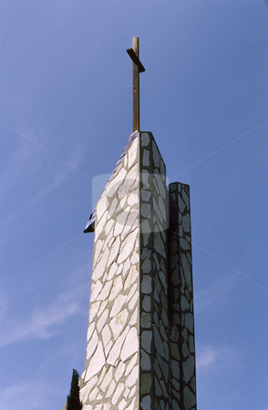 To use this stock image in your creative project, please select the size you need over to the right and click the "Add to Cart" button.
Your downloaded image will come with the Cutcaster watermark removed so don’t worry about the watermark you see on this page. Church tower stock photo, Church tower of unusual design and shape with cross by Joseph Ligori