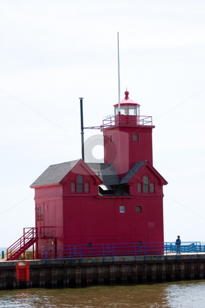 To use this stock image in your creative project, please select the size you need over to the right and click the "Add to Cart" button.
Your downloaded image will come with the Cutcaster watermark removed so don’t worry about the watermark you see on this page. Holland Michigan Lighthouse stock photo, by Ramses Racelis