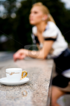 To use this stock image in your creative project, please select the size you need over to the right and click the "Add to Cart" button.
Your downloaded image will come with the Cutcaster watermark removed so don’t worry about the watermark you see on this page. Beautiful young woman and coffee stock photo, Blond lovely young woman drinking coffee outside by Vitaly Sokolovskiy