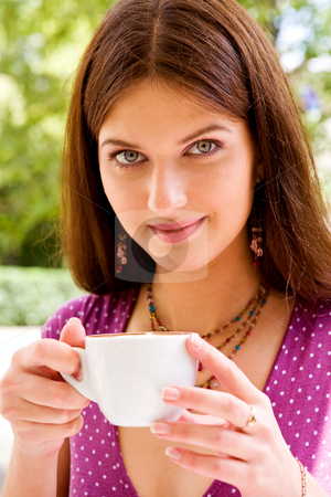 To use this stock image in your creative project, please select the size you need over to the right and click the "Add to Cart" button.
Your downloaded image will come with the Cutcaster watermark removed so don’t worry about the watermark you see on this page. Beautiful young woman and coffee stock photo, Smiling lovely young woman drinking coffee outside by Vitaly Sokolovskiy