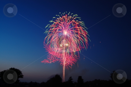 To use this stock image in your creative project, please select the size you need over to the right and click the "Add to Cart" button.
Your downloaded image will come with the Cutcaster watermark removed so don’t worry about the watermark you see on this page. Colorful fireworks at Twilight stock photo, Fireworks in Goshen, Indiana, USA by Heather Shelley