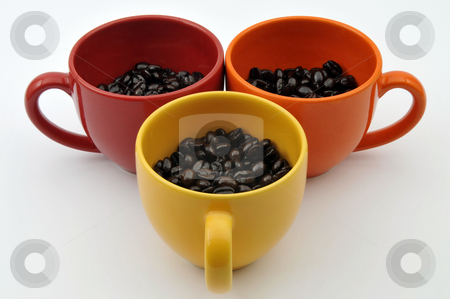 To use this stock image in your creative project, please select the size you need over to the right and click the "Add to Cart" button.
Your downloaded image will come with the Cutcaster watermark removed so don’t worry about the watermark you see on this page. Cups with coffe beans stock photo, Three colorful cups full with coffe beans isolated on white by Csaba Zsarnowszky