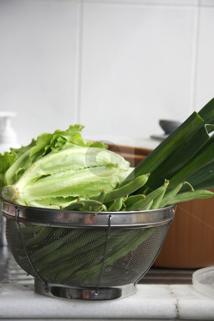 To use this stock image in your creative project, please select the size you need over to the right and click the "Add to Cart" button.
Your downloaded image will come with the Cutcaster watermark removed so don’t worry about the watermark you see on this page. Fresh vegetables stock photo, Fresh raw green leafy vegetables washed in collander by Kheng Guan Toh