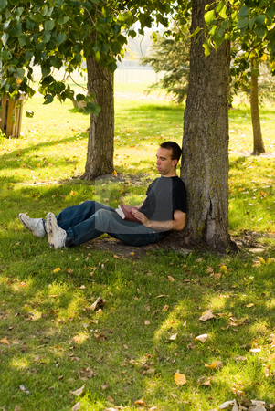 To use this stock image in your creative project, please select the size you need over to the right and click the "Add to Cart" button.
Your downloaded image will come with the Cutcaster watermark removed so don’t worry about the watermark you see on this page. Reading In The Park stock photo, A man sitting under a tree reading in the park by Richard Nelson