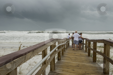 To use this stock image in your creative project, please select the size you need over to the right and click the "Add to Cart" button.
Your downloaded image will come with the Cutcaster watermark removed so don’t worry about the watermark you see on this page. Gustav Walkway stock photo, PENSACOLA - SEP 1: Spectators watch from the beach walkway while Hurricane Gustav rolls in on September 1, 2008. Gustav damage is estimated in excess of $20 billion. by A Cotton Photo