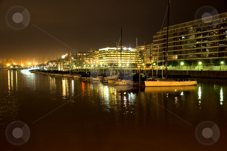 To use this stock image in your creative project, please select the size you need over to the right and click the "Add to Cart" button.
Your downloaded image will come with the Cutcaster watermark removed so don’t worry about the watermark you see on this page. Puerto Madero at Night stock photo, The night time view of Puerto Madero in central Buenos Aires, Argentina by Lee Torrens