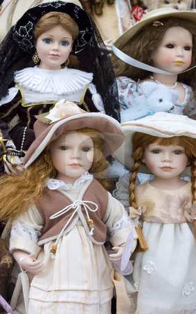 To use this stock image in your creative project, please select the size you need over to the right and click the "Add to Cart" button.
Your downloaded image will come with the Cutcaster watermark removed so don’t worry about the watermark you see on this page. Delicate Dolls stock photo, Four delicate dolls on display by Lee Torrens