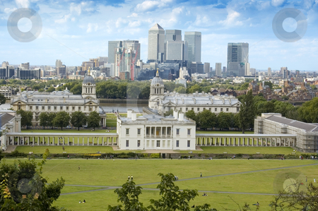 To use this stock image in your creative project, please select the size you need over to the right and click the "Add to Cart" button.
Your downloaded image will come with the Cutcaster watermark removed so don’t worry about the watermark you see on this page. Looking over Greenwich stock photo, London's national maritime museum with Canary Wharf in the background by Lee Torrens
