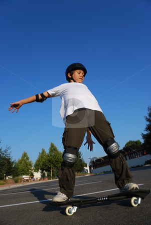 To use this stock image in your creative project, please select the size you need over to the right and click the "Add to Cart" button.
Your downloaded image will come with the Cutcaster watermark removed so don’t worry about the watermark you see on this page. Balancing the Skateboard stock photo, Boy balancing the skateboard shown against the blue sky by Denis Radovanovic