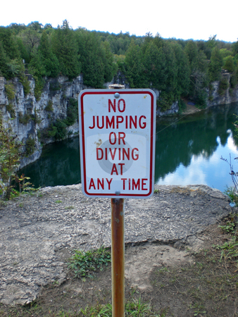 To use this stock image in your creative project, please select the size you need over to the right and click the "Add to Cart" button.
Your downloaded image will come with the Cutcaster watermark removed so don’t worry about the watermark you see on this page. No diving from quarry cliff stock photo, by J.G. Byers