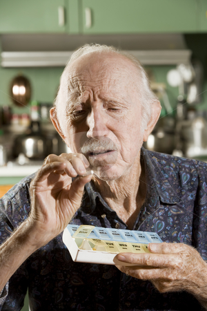 To use this stock image in your creative project, please select the size you need over to the right and click the "Add to Cart" button.
Your downloaded image will come with the Cutcaster watermark removed so don’t worry about the watermark you see on this page. Elder Man with a Pill Case stock photo, Portrait of Elder Man Discussing Medications by Scott Griessel