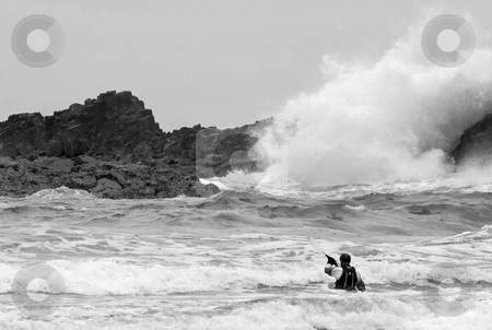 To use this stock image in your creative project, please select the size you need over to the right and click the "Add to Cart" button.
Your downloaded image will come with the Cutcaster watermark removed so don’t worry about the watermark you see on this page. In the Face of the Tempest stock photo, A lone kayaker facing the explosive force of high tide on a stormy day at Ecola Starte PArk along the Oregon Coast by Mike Dawson