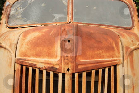 To use this stock image in your creative project, please select the size you need over to the right and click the "Add to Cart" button.
Your downloaded image will come with the Cutcaster watermark removed so don’t worry about the watermark you see on this page. Big Old Truck stock photo, Big truck put out to pasture and aged by rust by Jack Schiffer