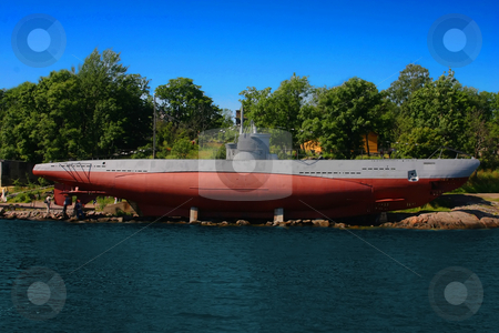 To use this stock image in your creative project, please select the size you need over to the right and click the "Add to Cart" button.
Your downloaded image will come with the Cutcaster watermark removed so don’t worry about the watermark you see on this page. Submarine on-shore stock photo, A Finnish submarine turned into a museum attraction by Arve Bettum