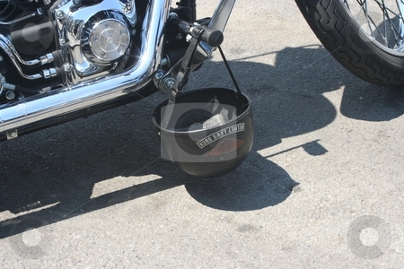 To use this stock image in your creative project, please select the size you need over to the right and click the "Add to Cart" button.
Your downloaded image will come with the Cutcaster watermark removed so don’t worry about the watermark you see on this page. Biker's Helmet stock photo, A Bikers motorcyle helment by Ryan Bouie
