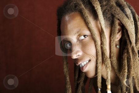 To use this stock image in your creative project, please select the size you need over to the right and click the "Add to Cart" button.
Your downloaded image will come with the Cutcaster watermark removed so don’t worry about the watermark you see on this page. African American Woman with Dreadlocks stock photo, Pretty African American Woman with Hair in Dreadlocks by Scott Griessel