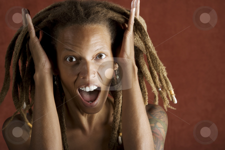 To use this stock image in your creative project, please select the size you need over to the right and click the "Add to Cart" button.
Your downloaded image will come with the Cutcaster watermark removed so don’t worry about the watermark you see on this page. Shocked African American Woman stock photo, Shocked African American Woman with Hair in Dreadlocks by Scott Griessel
