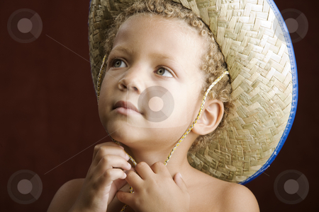 To use this stock image in your creative project, please select the size you need over to the right and click the "Add to Cart" button.
Your downloaded image will come with the Cutcaster watermark removed so don’t worry about the watermark you see on this page. Little Boy in a Straw Hat stock photo, Little boy with curly hair and blue eyes in a straw hat by Scott Griessel