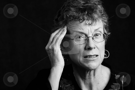 To use this stock image in your creative project, please select the size you need over to the right and click the "Add to Cart" button.
Your downloaded image will come with the Cutcaster watermark removed so don’t worry about the watermark you see on this page. Woman with a headache stock photo, Senior woman with a headache rubbing her temple by Scott Griessel