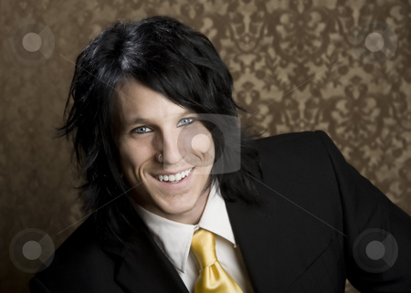 To use this stock image in your creative project, please select the size you need over to the right and click the "Add to Cart" button.
Your downloaded image will come with the Cutcaster watermark removed so don’t worry about the watermark you see on this page. Handsome man in a business suit stock photo, Handsome man seated in a business suit by Scott Griessel