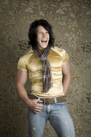 To use this stock image in your creative project, please select the size you need over to the right and click the "Add to Cart" button.
Your downloaded image will come with the Cutcaster watermark removed so don’t worry about the watermark you see on this page. Rock Star Screaming stock photo, Rock and Roll Hipster in a tight yellow shirt by Scott Griessel