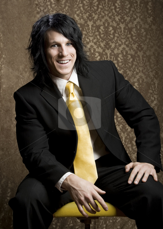To use this stock image in your creative project, please select the size you need over to the right and click the "Add to Cart" button.
Your downloaded image will come with the Cutcaster watermark removed so don’t worry about the watermark you see on this page. Handsome man in a business suit stock photo, Handsome man seated in a business suit by Scott Griessel