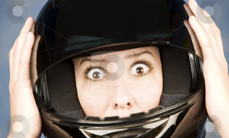 To use this stock image in your creative project, please select the size you need over to the right and click the "Add to Cart" button.
Your downloaded image will come with the Cutcaster watermark removed so don’t worry about the watermark you see on this page. Woman with a motrcycle helmet and surprised expression stock photo, Woman with a black motrcycle helmet and surprised expression by Scott Griessel