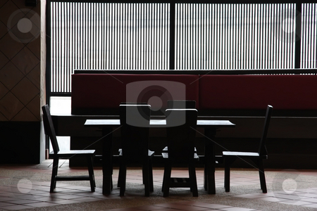 To use this stock image in your creative project, please select the size you need over to the right and click the "Add to Cart" button.
Your downloaded image will come with the Cutcaster watermark removed so don’t worry about the watermark you see on this page. Restaurant furniture stock photo, Wooden restaurant table and chairs high contrast by Kheng Guan Toh